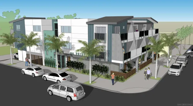 a white building covered with tall trees