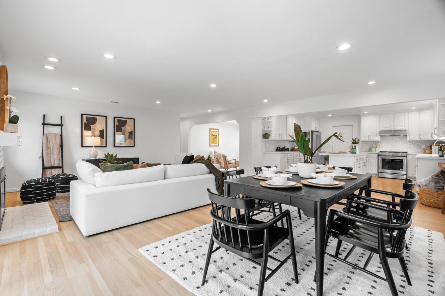 1002 Oaktree Drive San Jose, CA 95129 - Photo 11 of 45 a view of a dining room with furniture and wooden floor