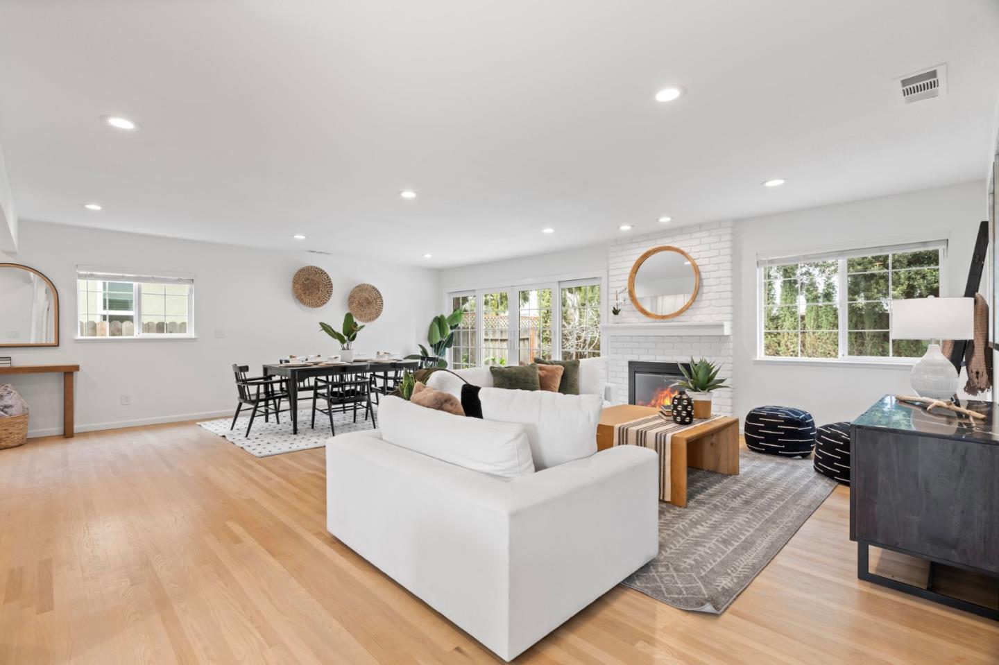 1002 Oaktree Drive San Jose, CA 95129 - Photo 2 of 45 a living room with furniture and a large window