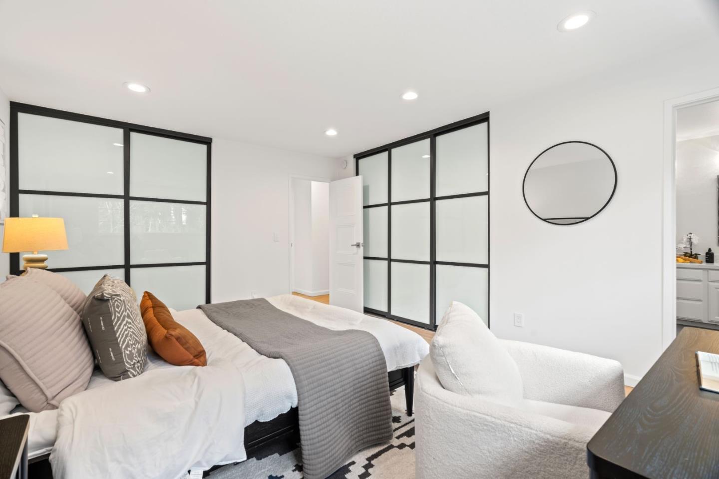 1002 Oaktree Drive San Jose, CA 95129 - Photo 26 of 45 a bedroom with a large bed and a window