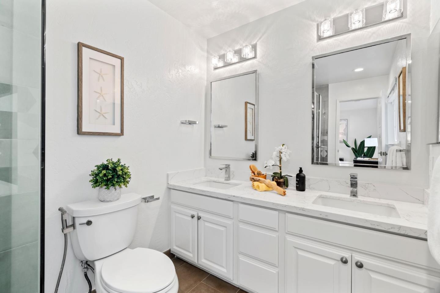 1002 Oaktree Drive San Jose, CA 95129 - Photo 27 of 45 a bathroom with a toilet sink and mirror