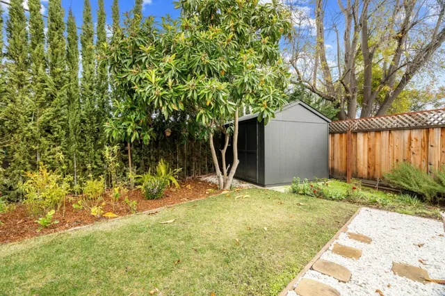 a house with trees in front of it