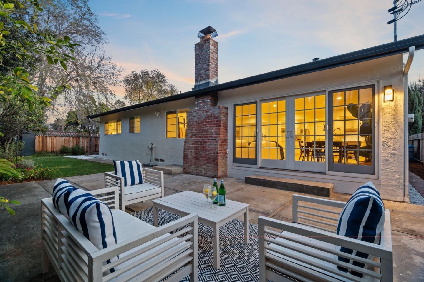 1002 Oaktree Drive San Jose, CA 95129 - Photo 39 of 45 a view of a patio with couches table and chairs and potted plants