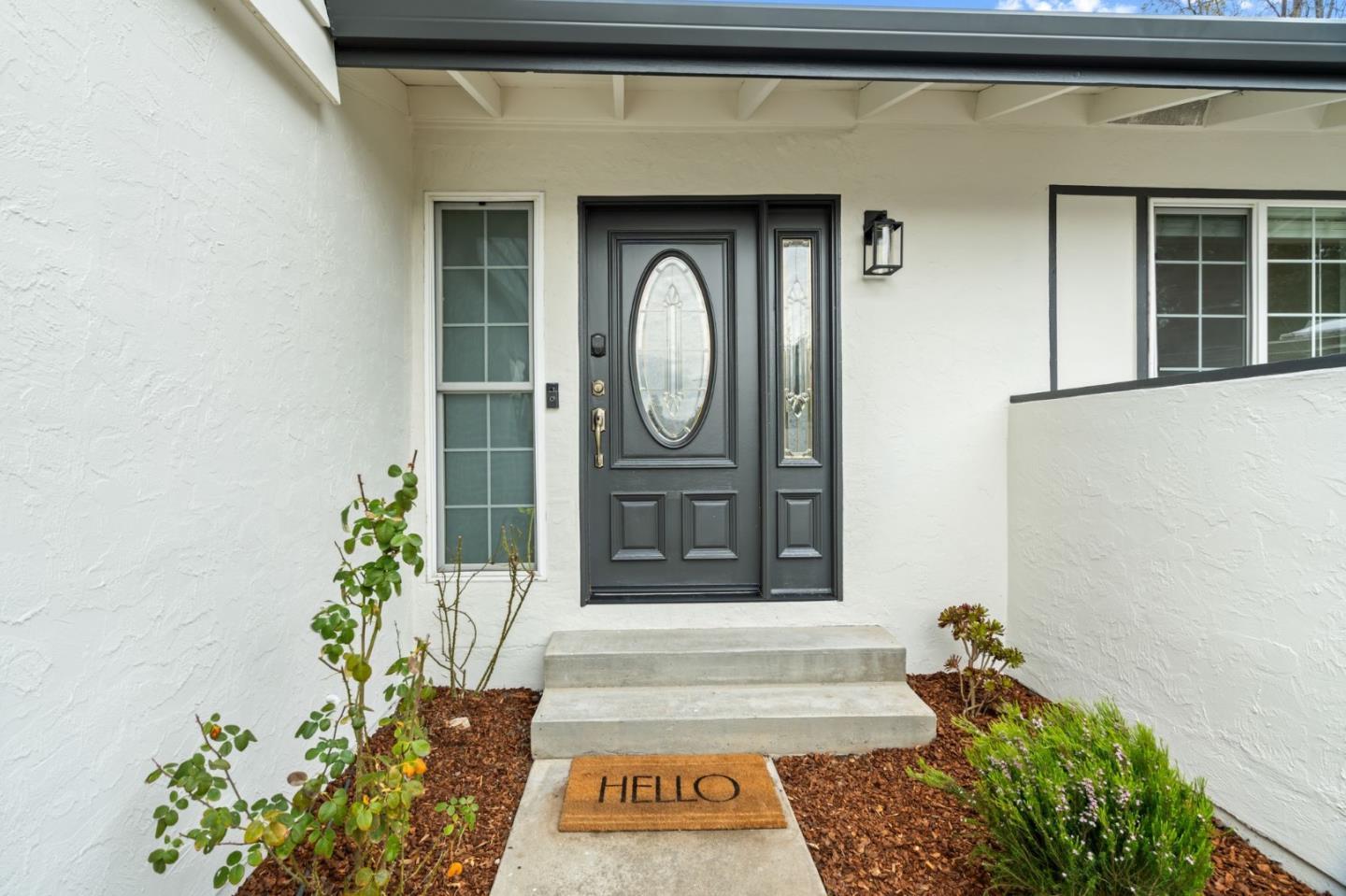 1002 Oaktree Drive San Jose, CA 95129 - Photo 4 of 45 a front view of a house