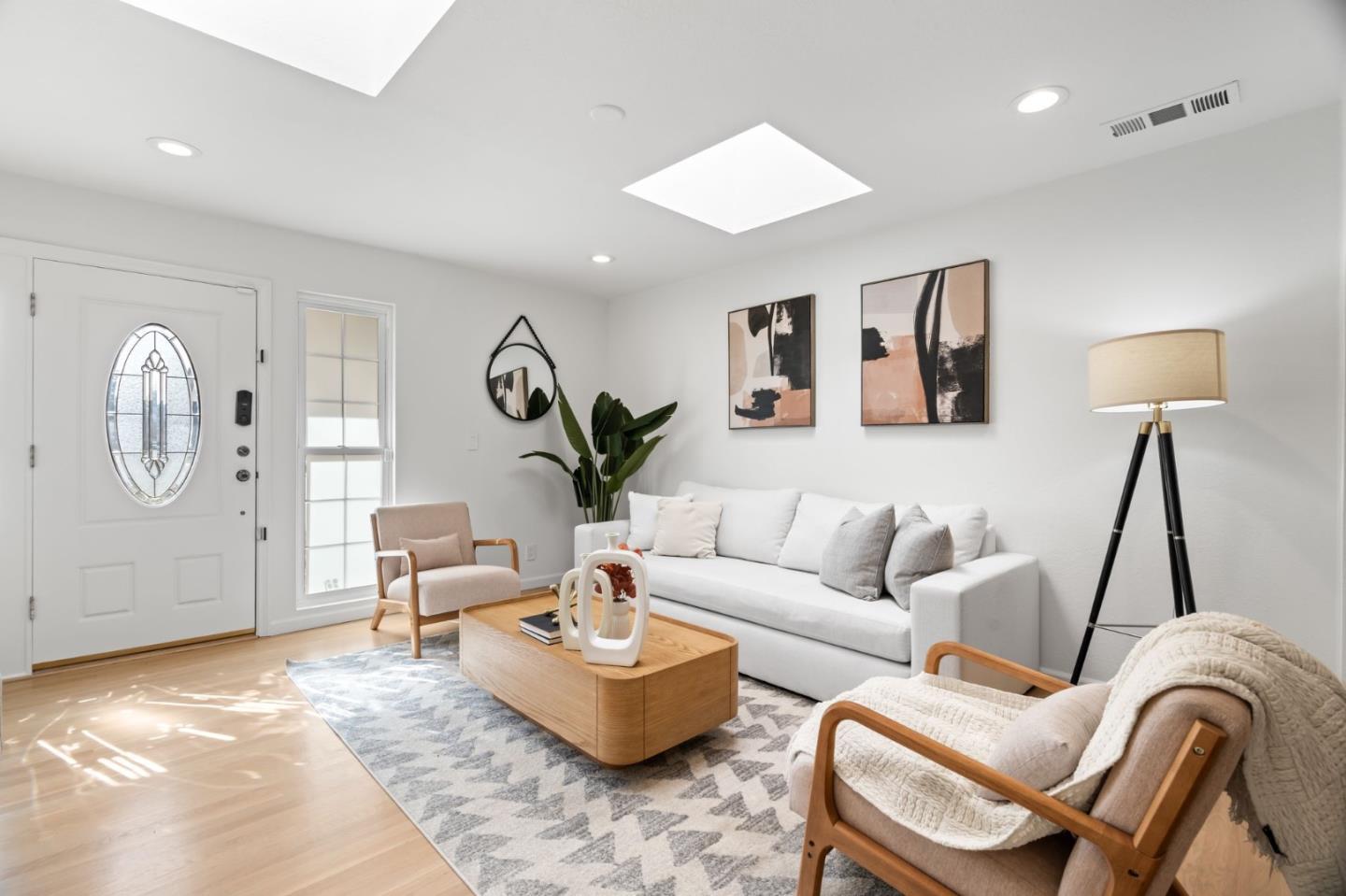 1002 Oaktree Drive San Jose, CA 95129 - Photo 6 of 45 a living room with furniture