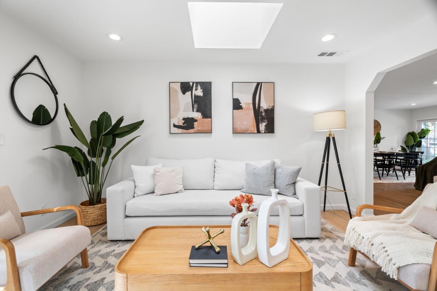 1002 Oaktree Drive San Jose, CA 95129 - Photo 7 of 45 a living room with furniture a couch and potted plant