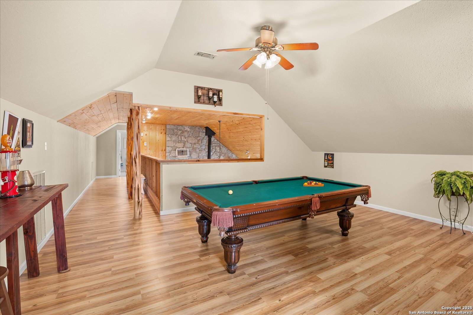 127 Camp Alzafar Road Boerne, TX 78006 - Photo 29 of 50 a room with furniture and wooden floor