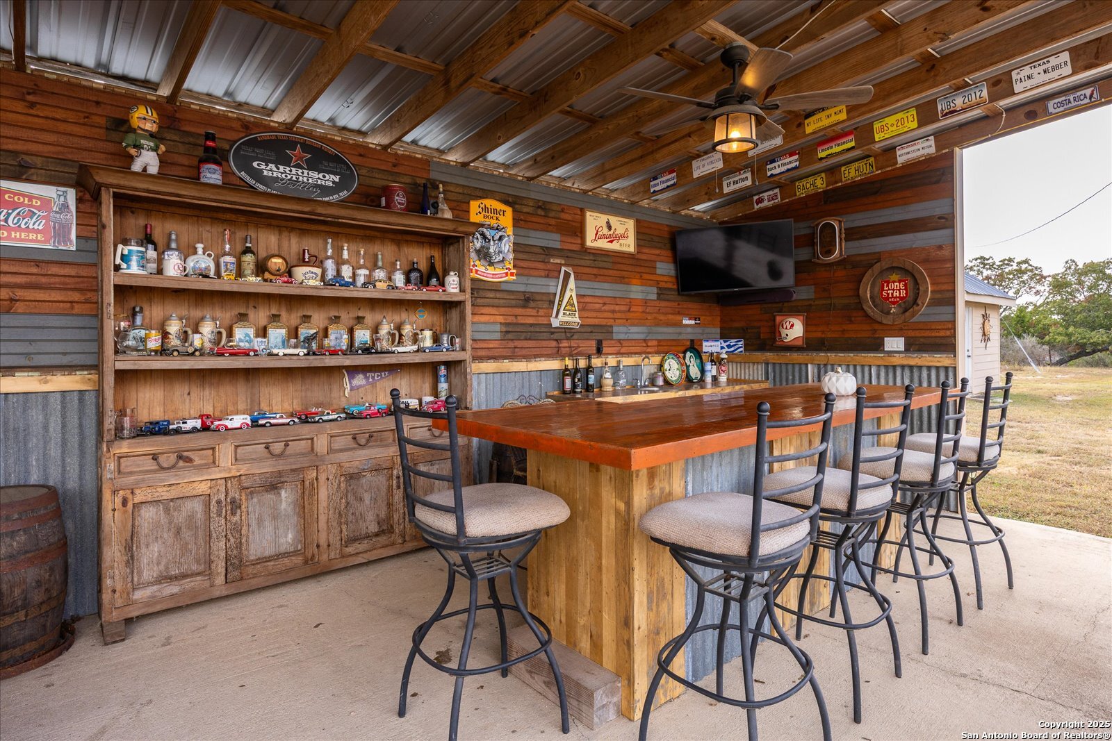 127 Camp Alzafar Road Boerne, TX 78006 - Photo 36 of 50 a table and chairs in a room