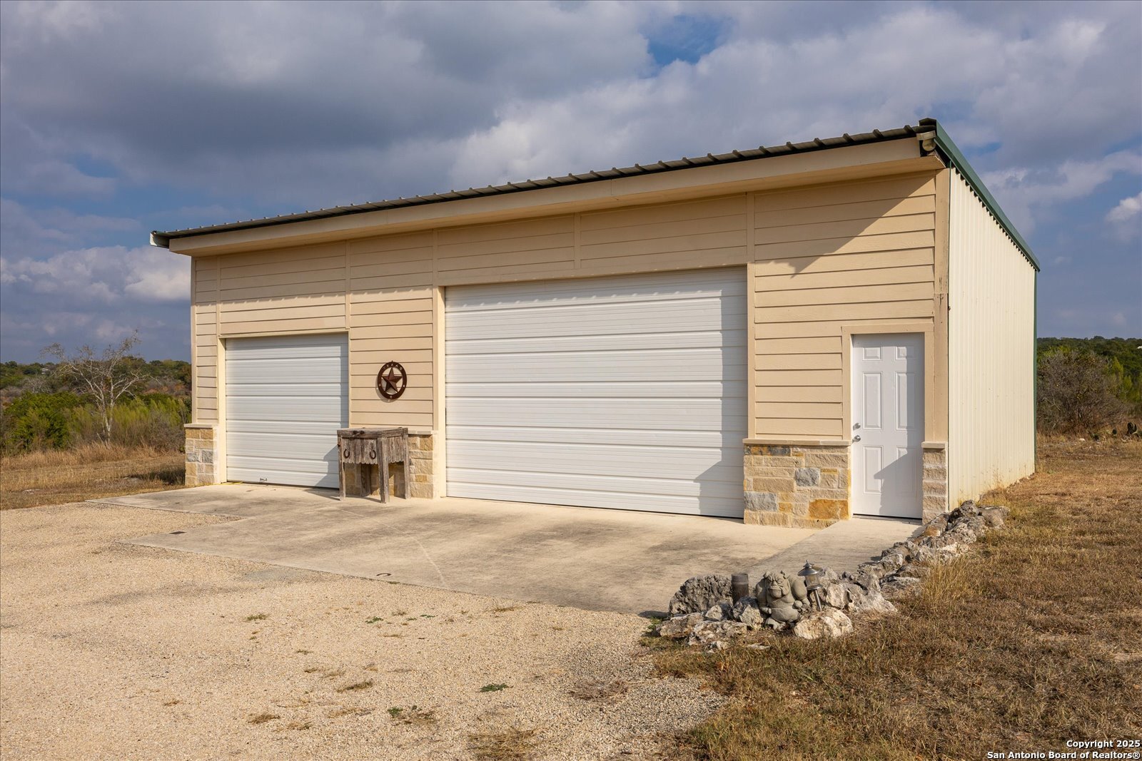 127 Camp Alzafar Road Boerne, TX 78006 - Photo 41 of 50 a view of a house with a yard