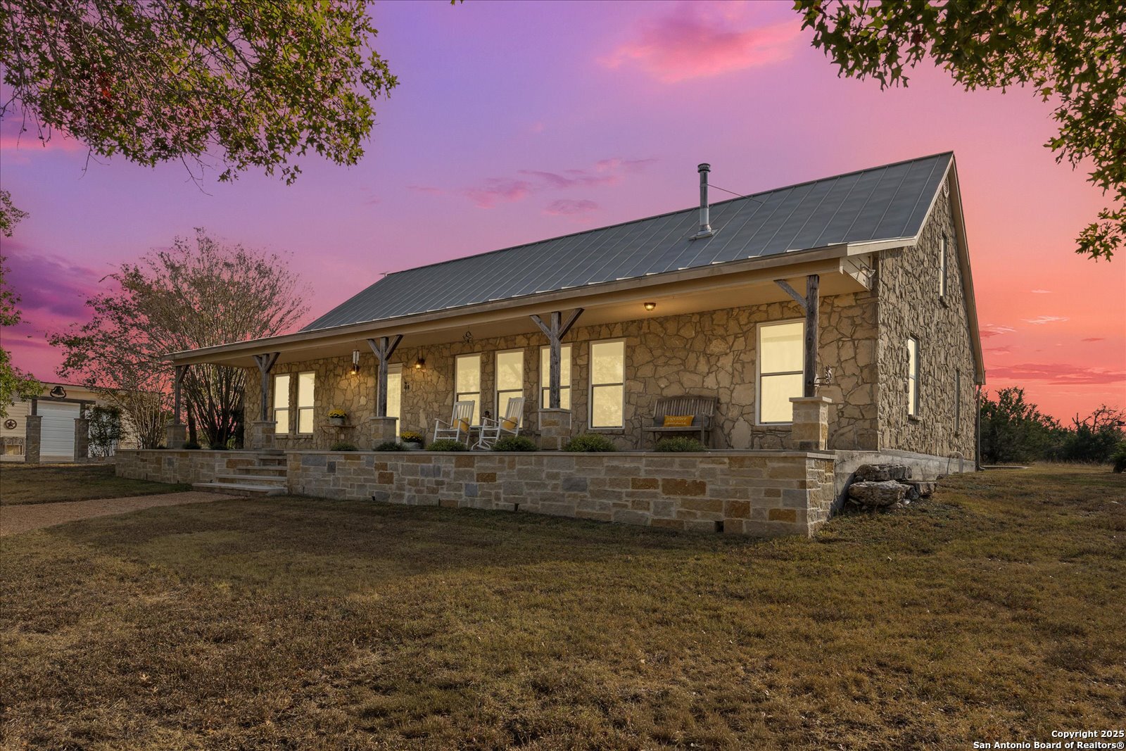 127 Camp Alzafar Road Boerne, TX 78006 - Photo 45 of 50 a front view of a house with a yard