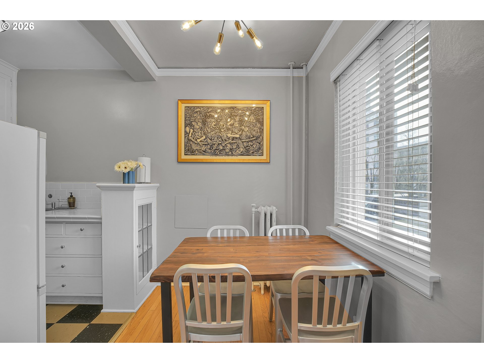 709 Southwest 16th Avenue, Unit 207 Portland, OR 97205 - Photo 26 of 47 a bedroom with a bed and a window