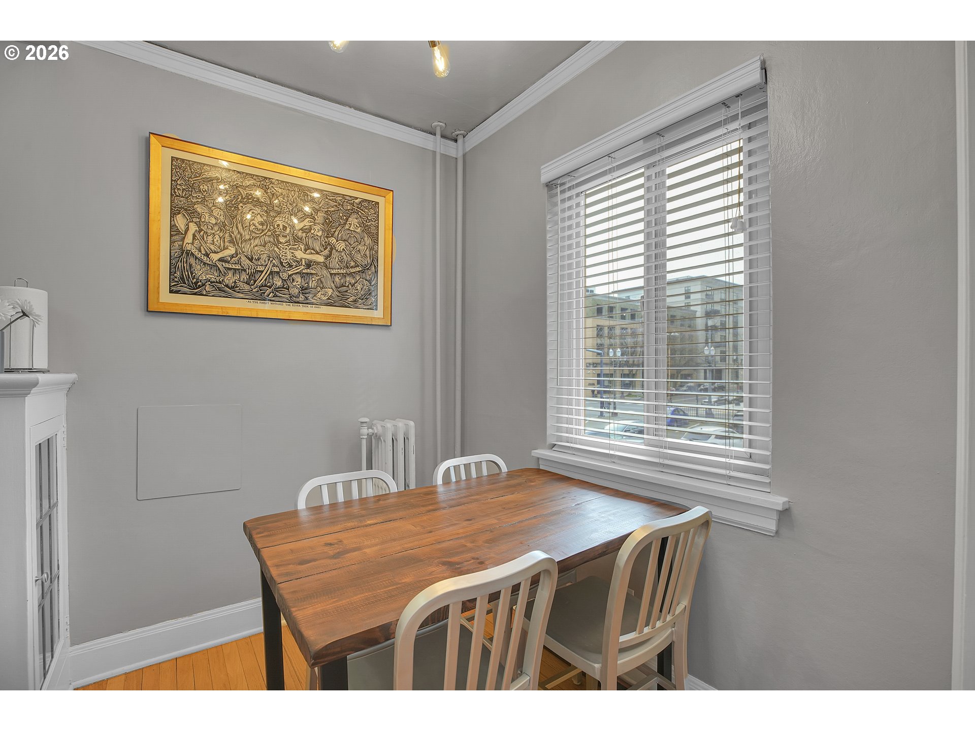 709 Southwest 16th Avenue, Unit 207 Portland, OR 97205 - Photo 27 of 47 a dining room with a table and chairs
