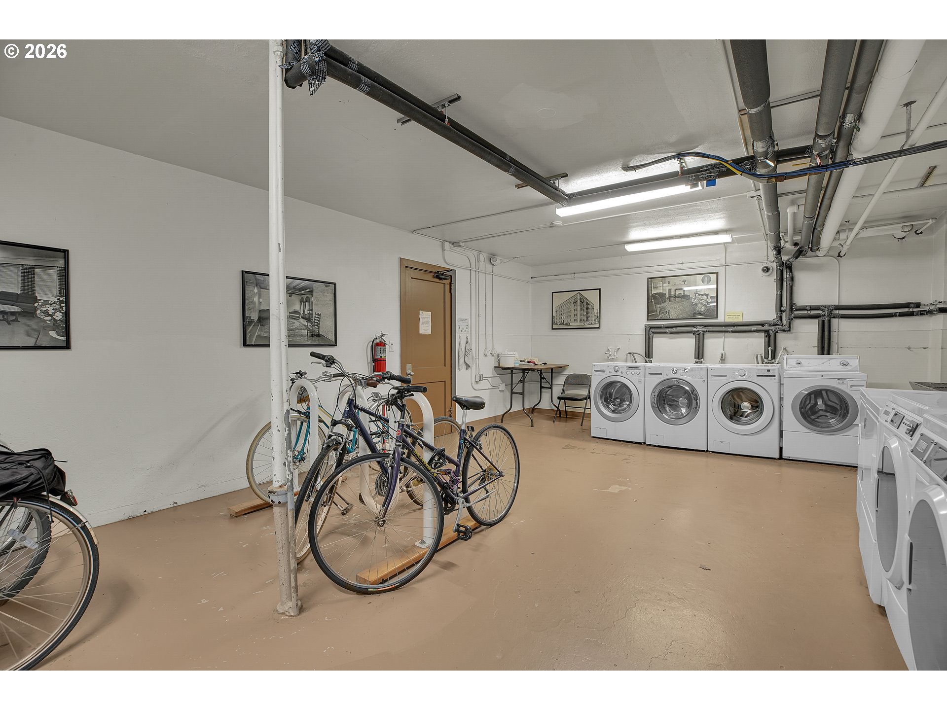 709 Southwest 16th Avenue, Unit 207 Portland, OR 97205 - Photo 36 of 47 a view of a livingroom with furniture and a fan