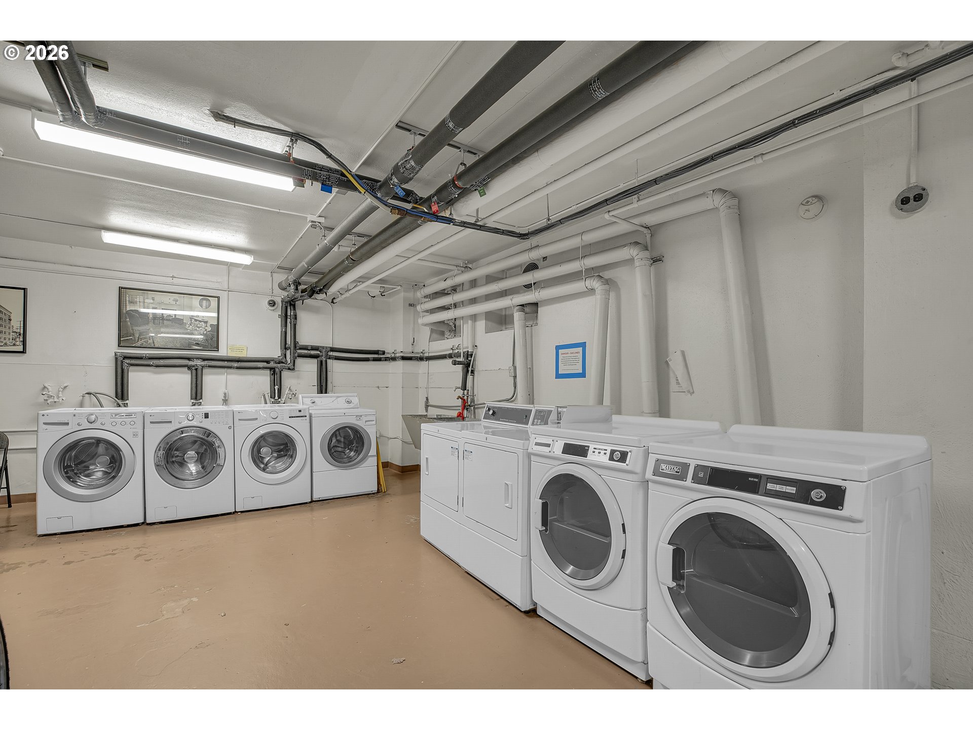 709 Southwest 16th Avenue, Unit 207 Portland, OR 97205 - Photo 37 of 47 a utility room with dryer and washer