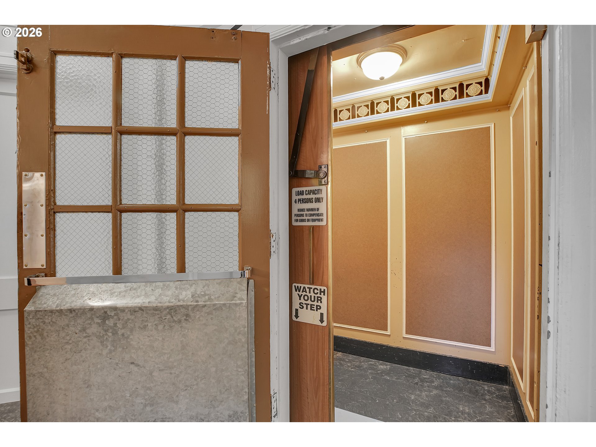 709 Southwest 16th Avenue, Unit 207 Portland, OR 97205 - Photo 40 of 47 a utility room with closet