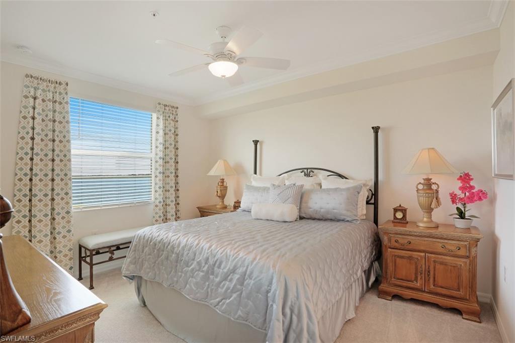 43010 Greenway Boulevard, Unit 234 Punta Gorda, FL 33982 - Photo 11 of 22 a bedroom with a bed and dresser