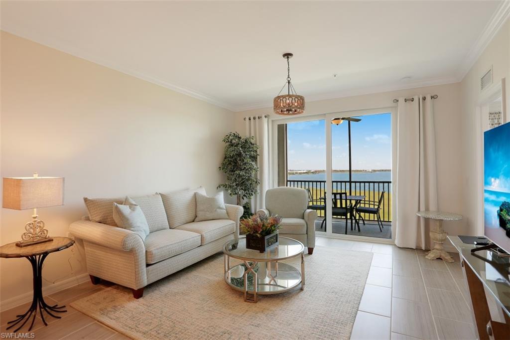 43010 Greenway Boulevard, Unit 234 Punta Gorda, FL 33982 - Photo 4 of 22 a living room with furniture