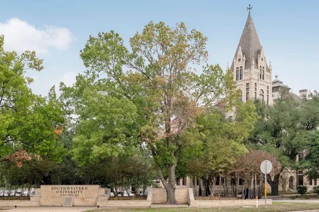a view of a cafe with sitting area