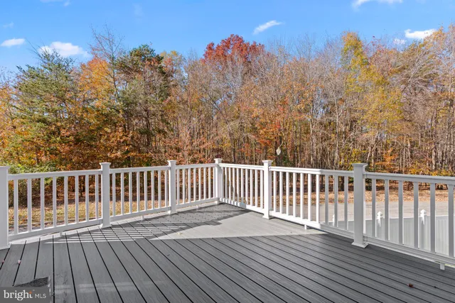 a view of a wooden roof deck