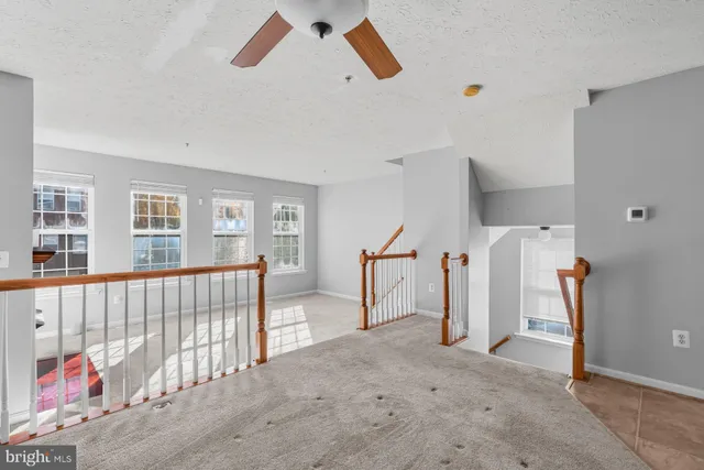 a view of livingroom with furniture and windows