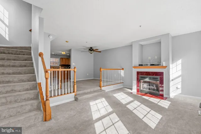 a view of entryway livingroom and hall