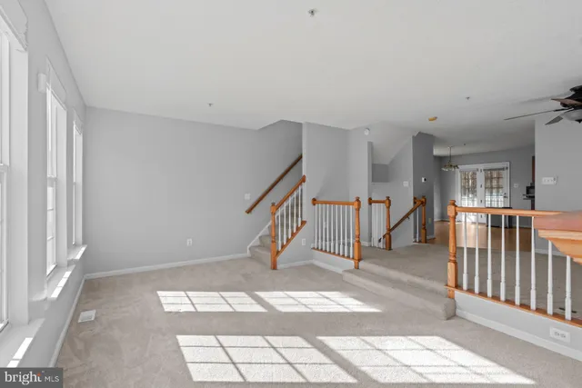 a view of a hallway with windows