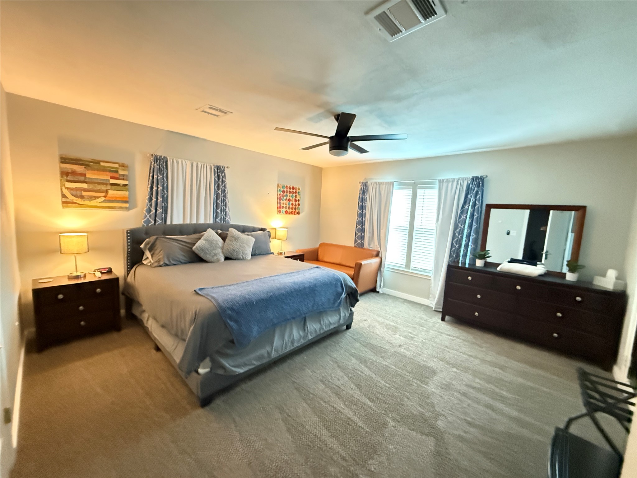 1909 Ruth Street Houston, TX 77004 - Photo 11 of 35 a bedroom with a bed and a large window
