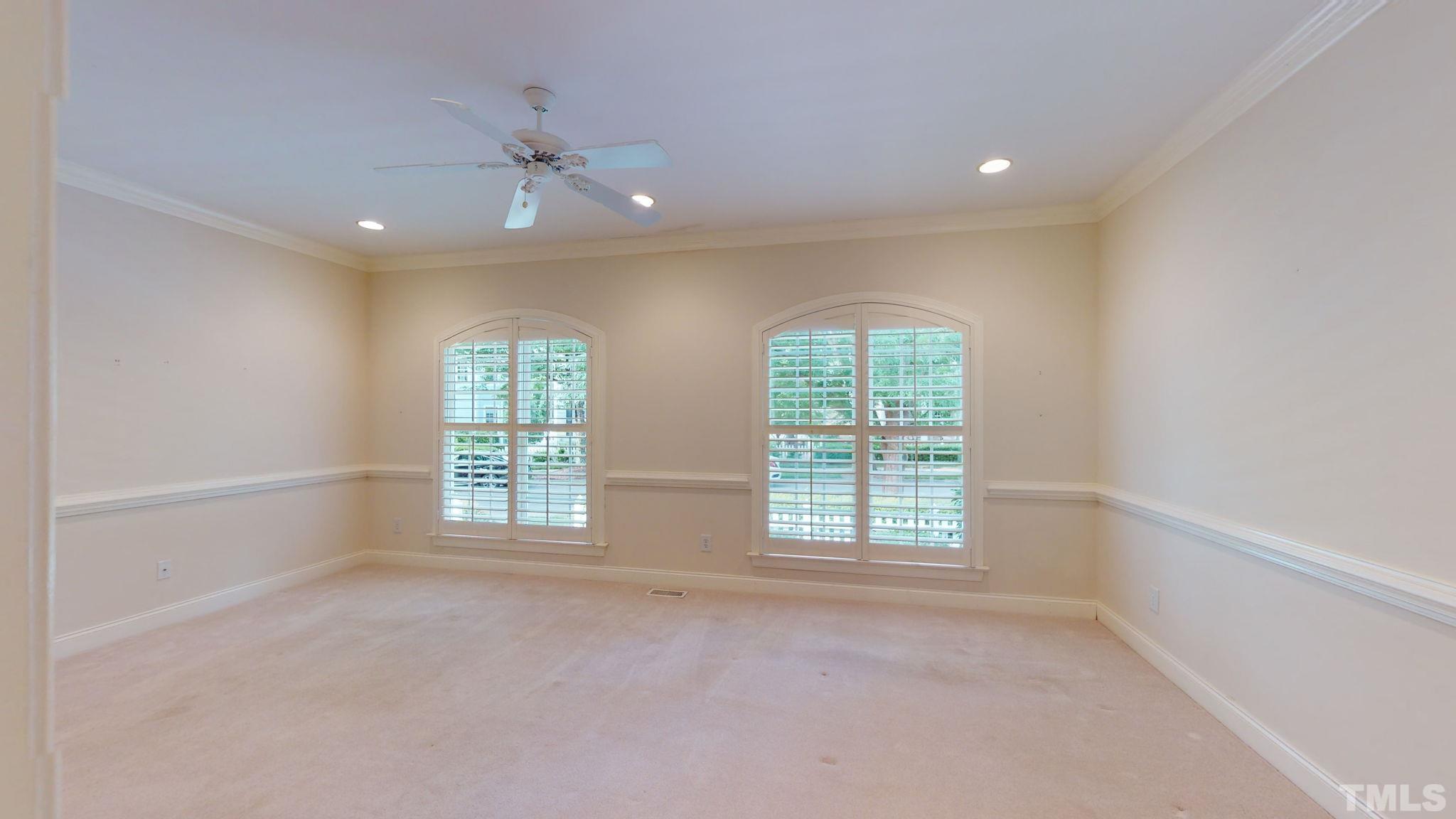 1931 Hornbeck Court Raleigh, NC 27614 - Photo 17 of 31 an empty room with windows and closet
