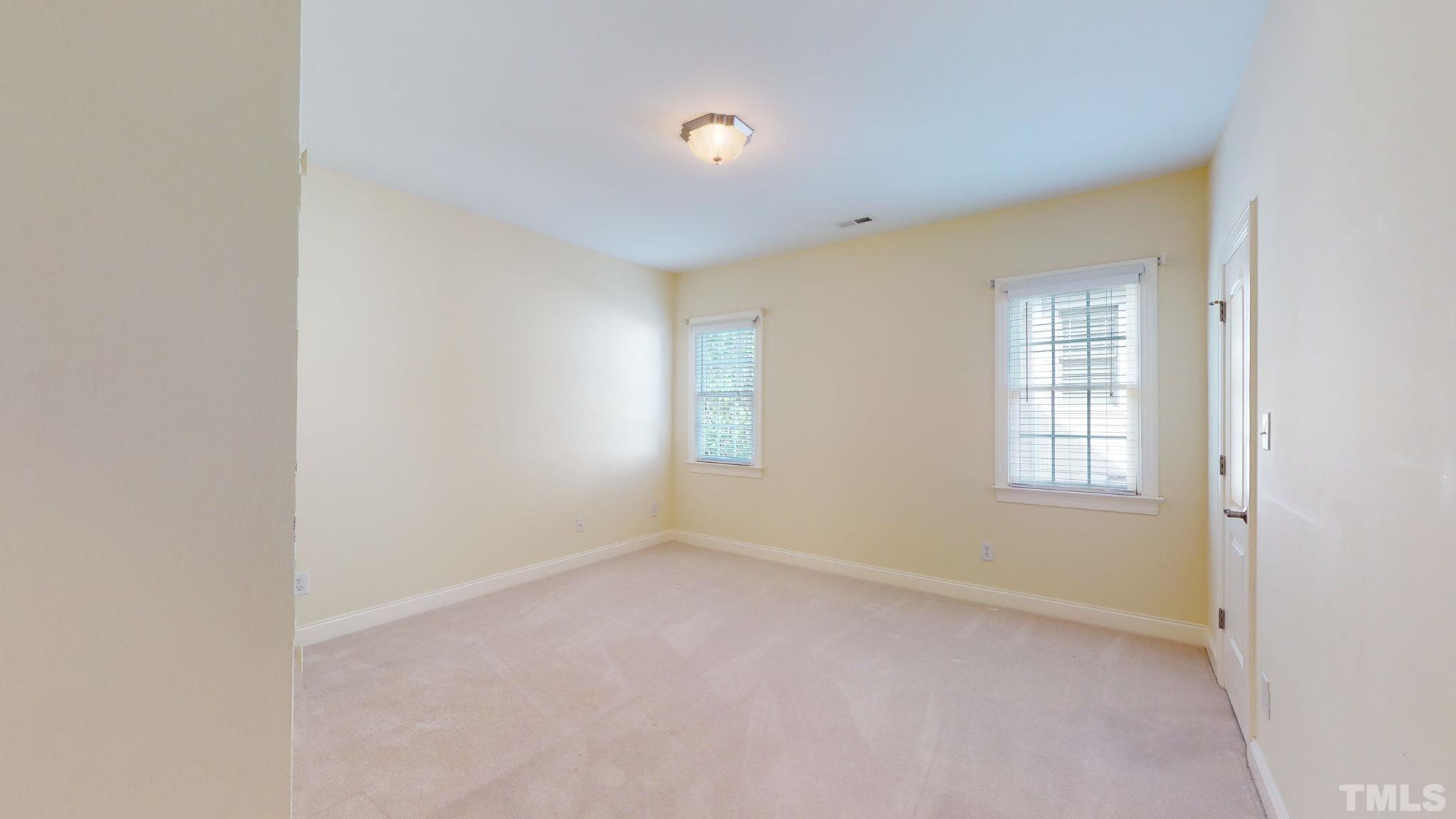 1931 Hornbeck Court Raleigh, NC 27614 - Photo 23 of 31 an empty room with a window