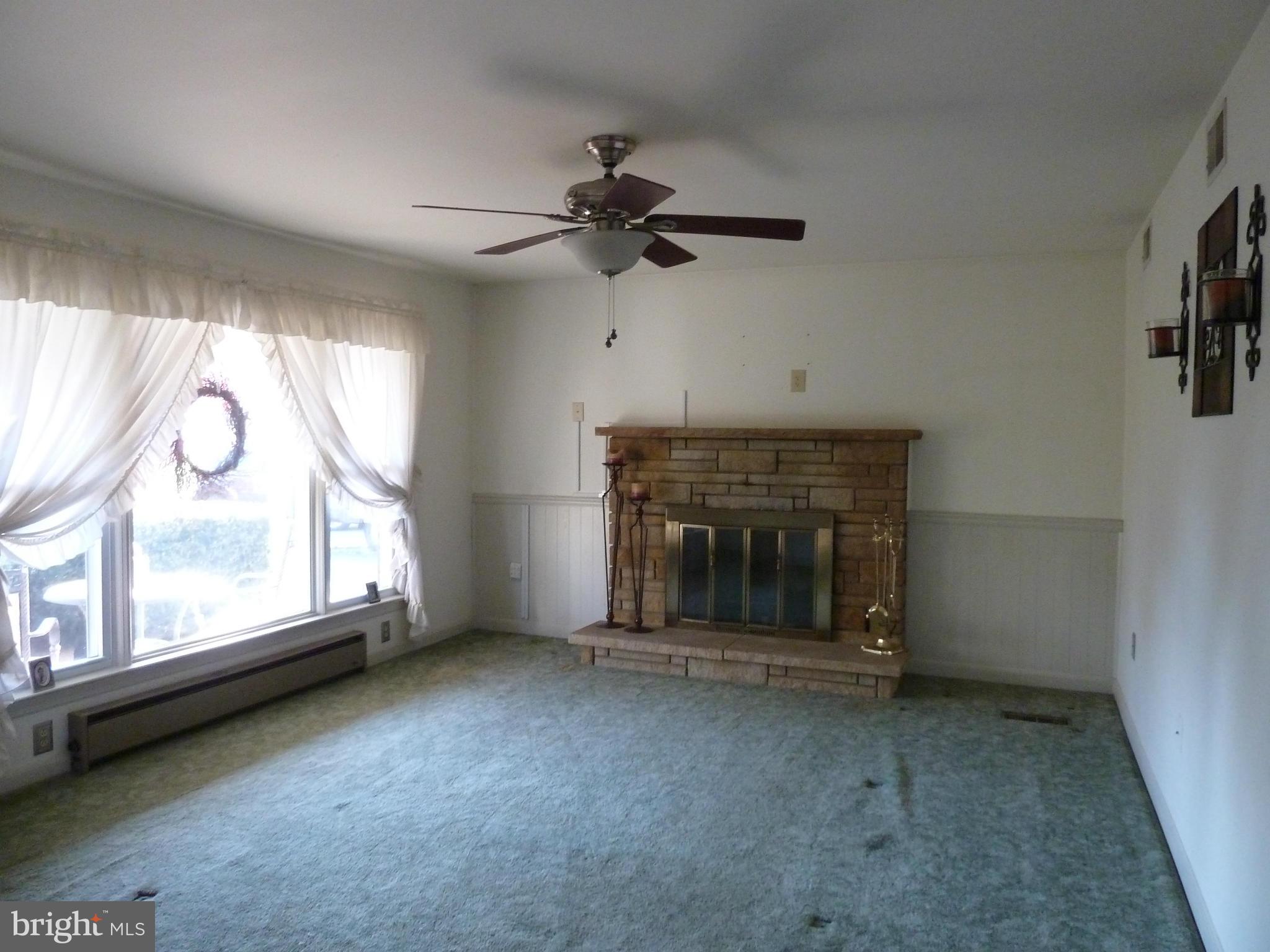 16534 Edward Doub Road Williamsport, MD 21795 - Photo 6 of 15 Living Room w/Wood Burning Fireplace