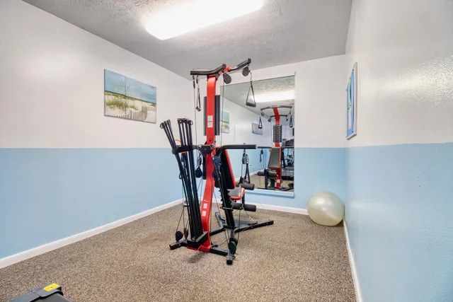 a view of a room with gym equipment