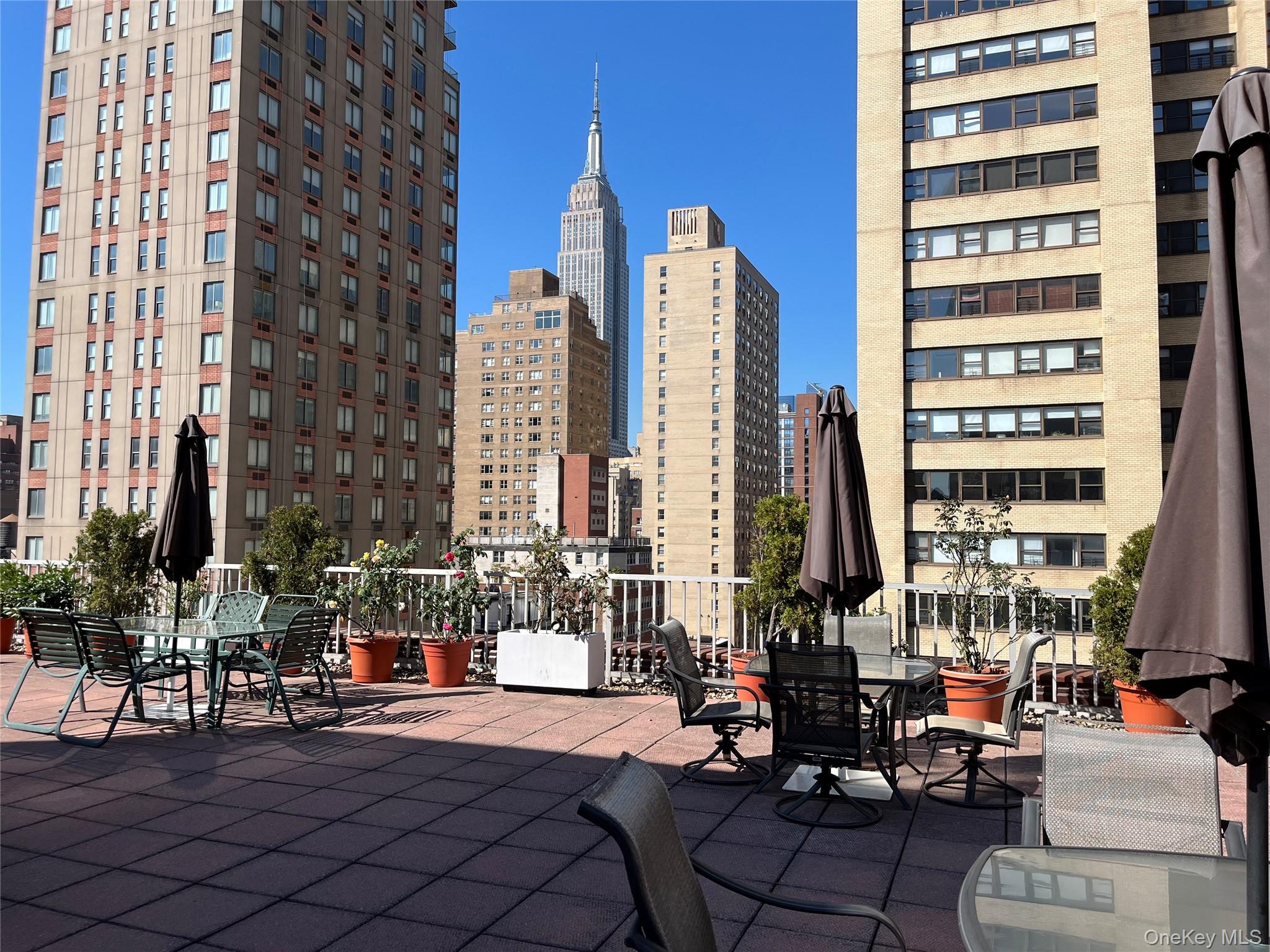 201 East 37th Street, Unit 7D Manhattan, NY 10016 - Photo 9 of 11 a view of a city with tall buildings