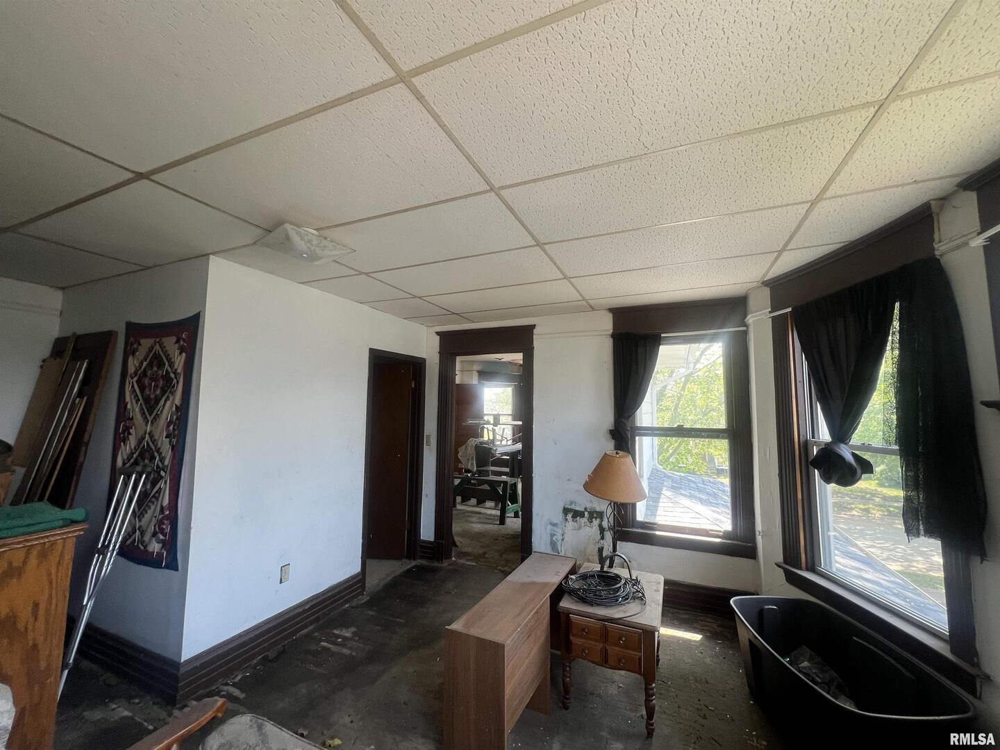 2220 Roosevelt Street Clinton, IA 52732 - Photo 14 of 18 a room with furniture and a large window