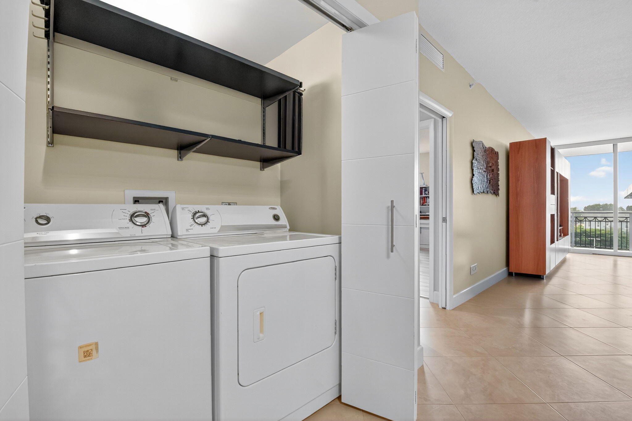 550 Okeechobee Boulevard, Unit 423 West Palm Beach, FL 33401 - Photo 32 of 120 Interior Laundry Closet
