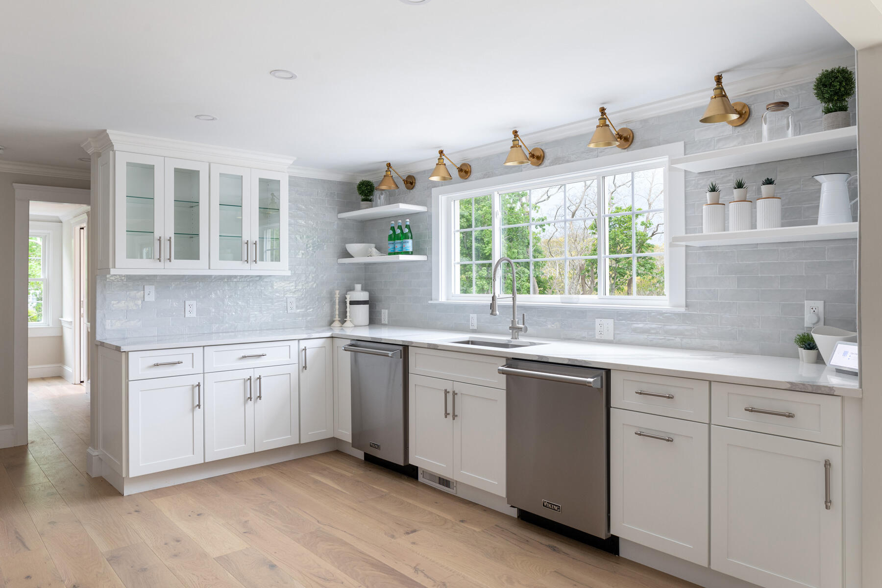 232 Tonset Road Orleans, MA 02653 - Photo 13 of 76 a kitchen with sink cabinets and window