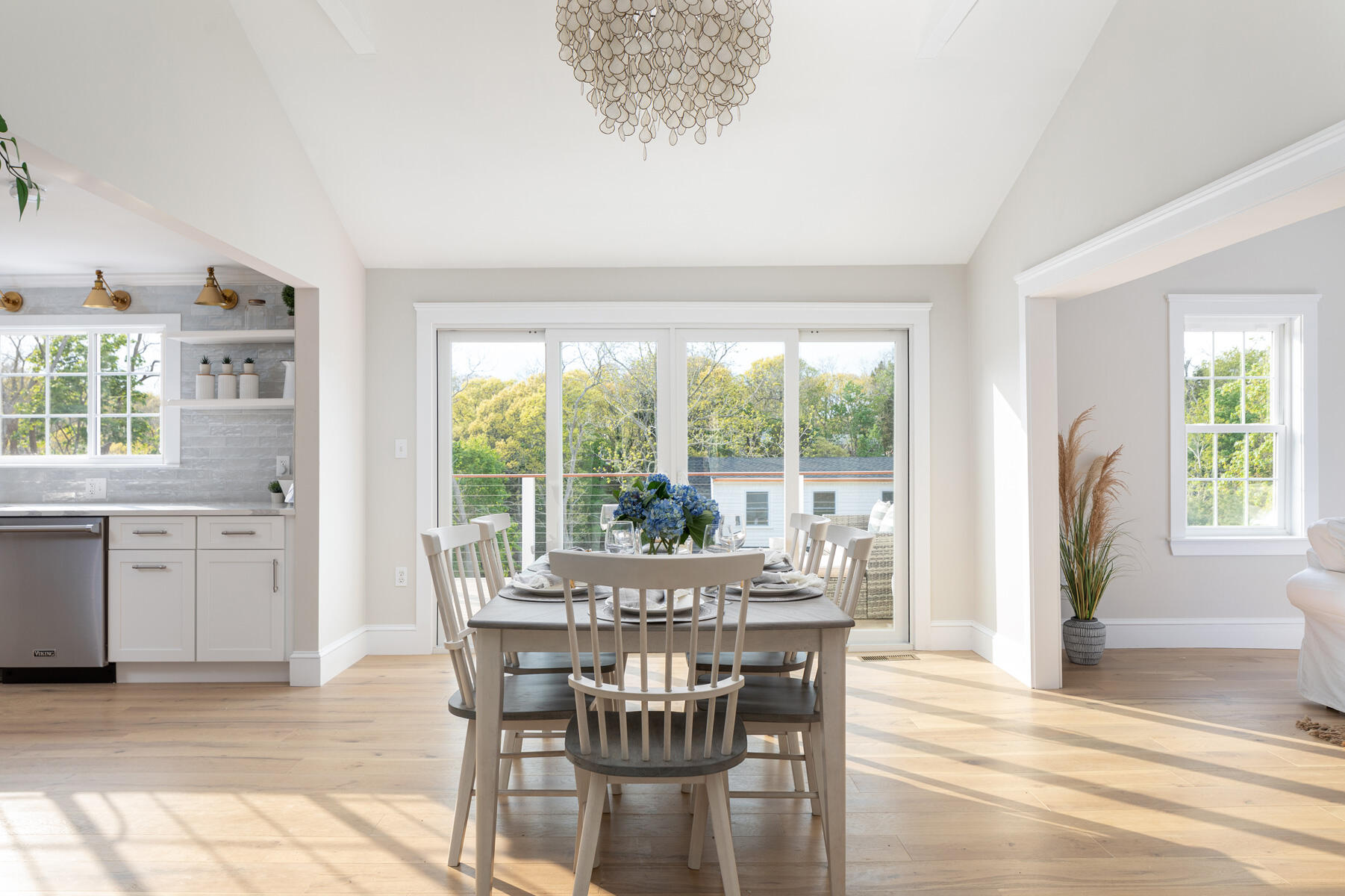 232 Tonset Road Orleans, MA 02653 - Photo 16 of 76 a view of a dining room with furniture window and outside view