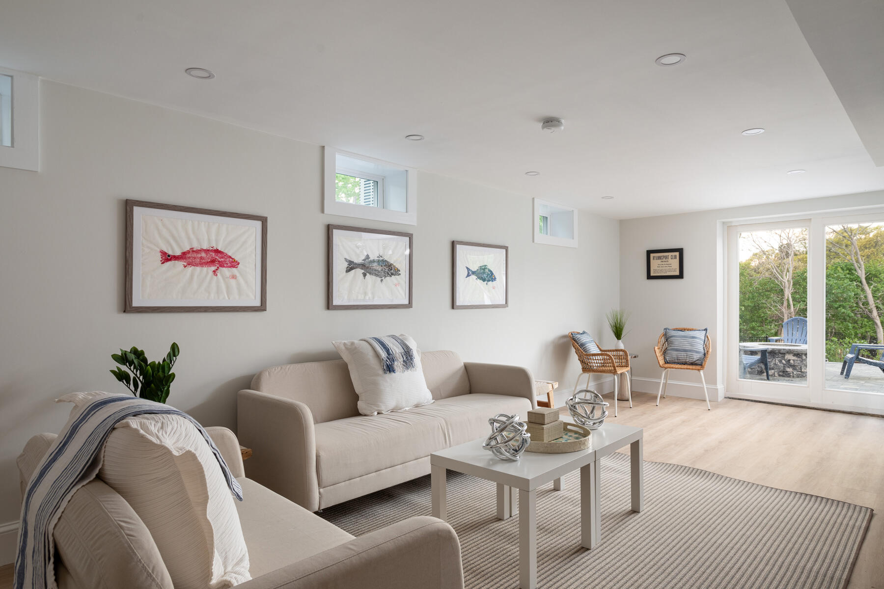 232 Tonset Road Orleans, MA 02653 - Photo 34 of 76 a living room with furniture and a large window