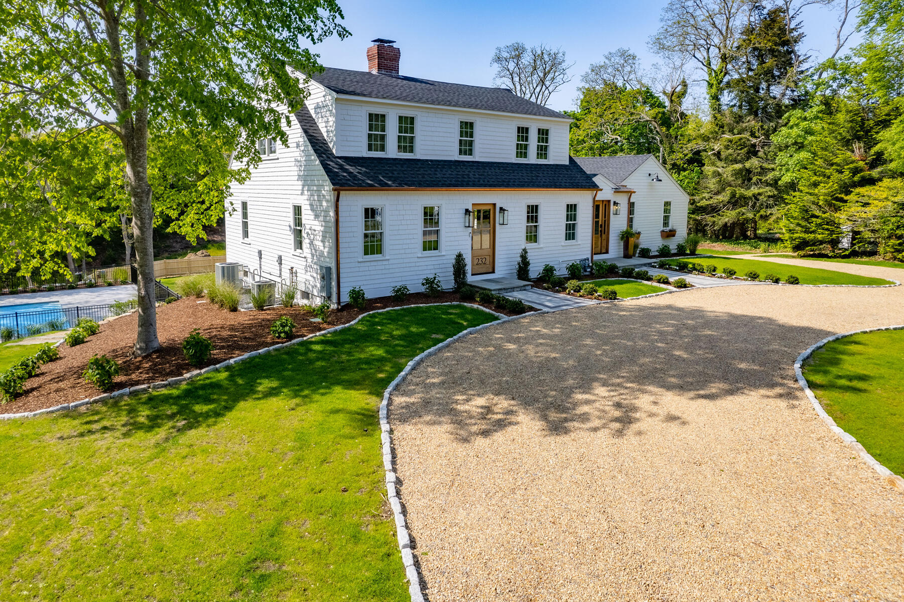 232 Tonset Road Orleans, MA 02653 - Photo 4 of 76 a front view of a house with a yard