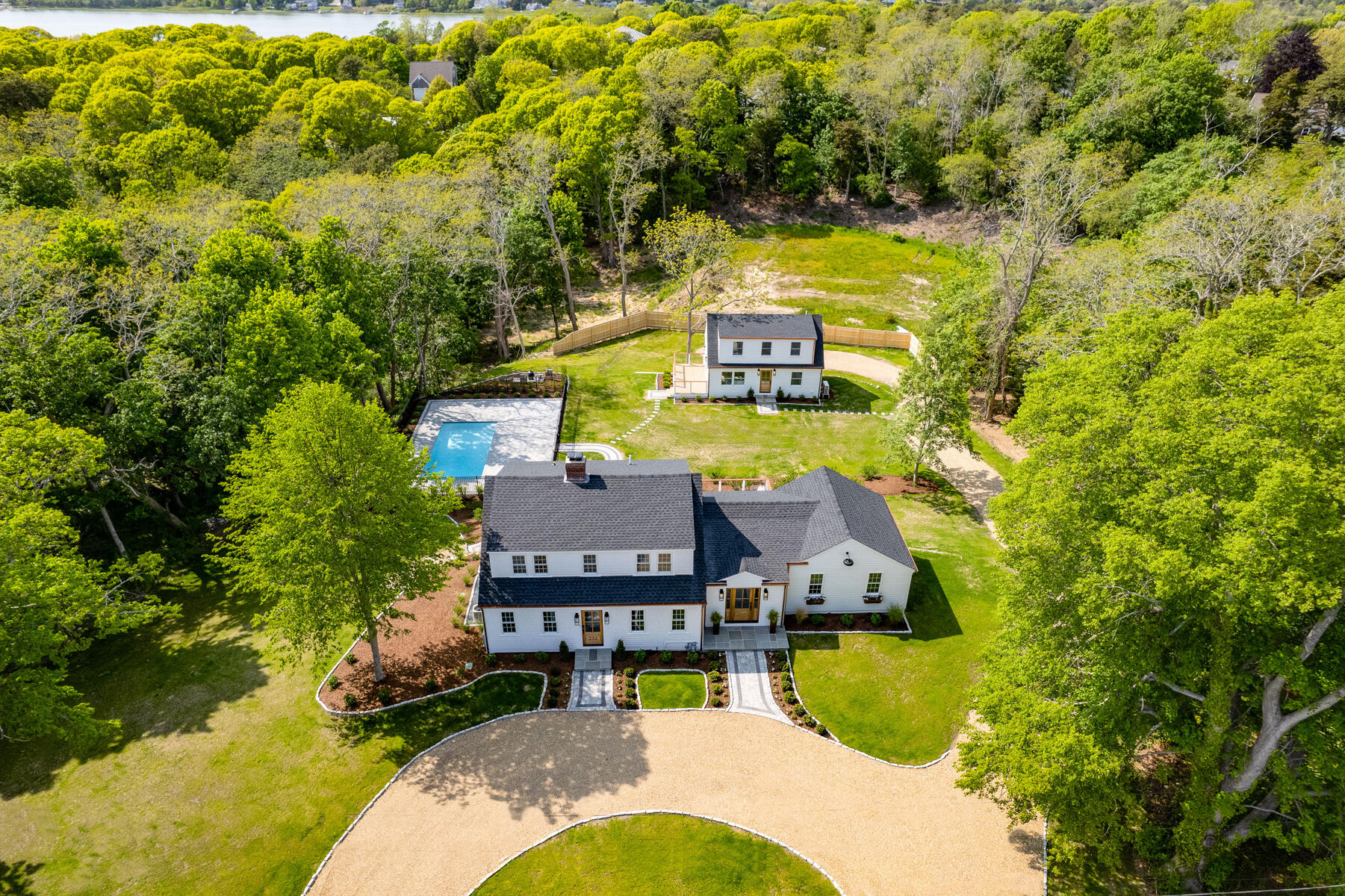 232 Tonset Road Orleans, MA 02653 - Photo 44 of 76 a view of a house with a swimming pool