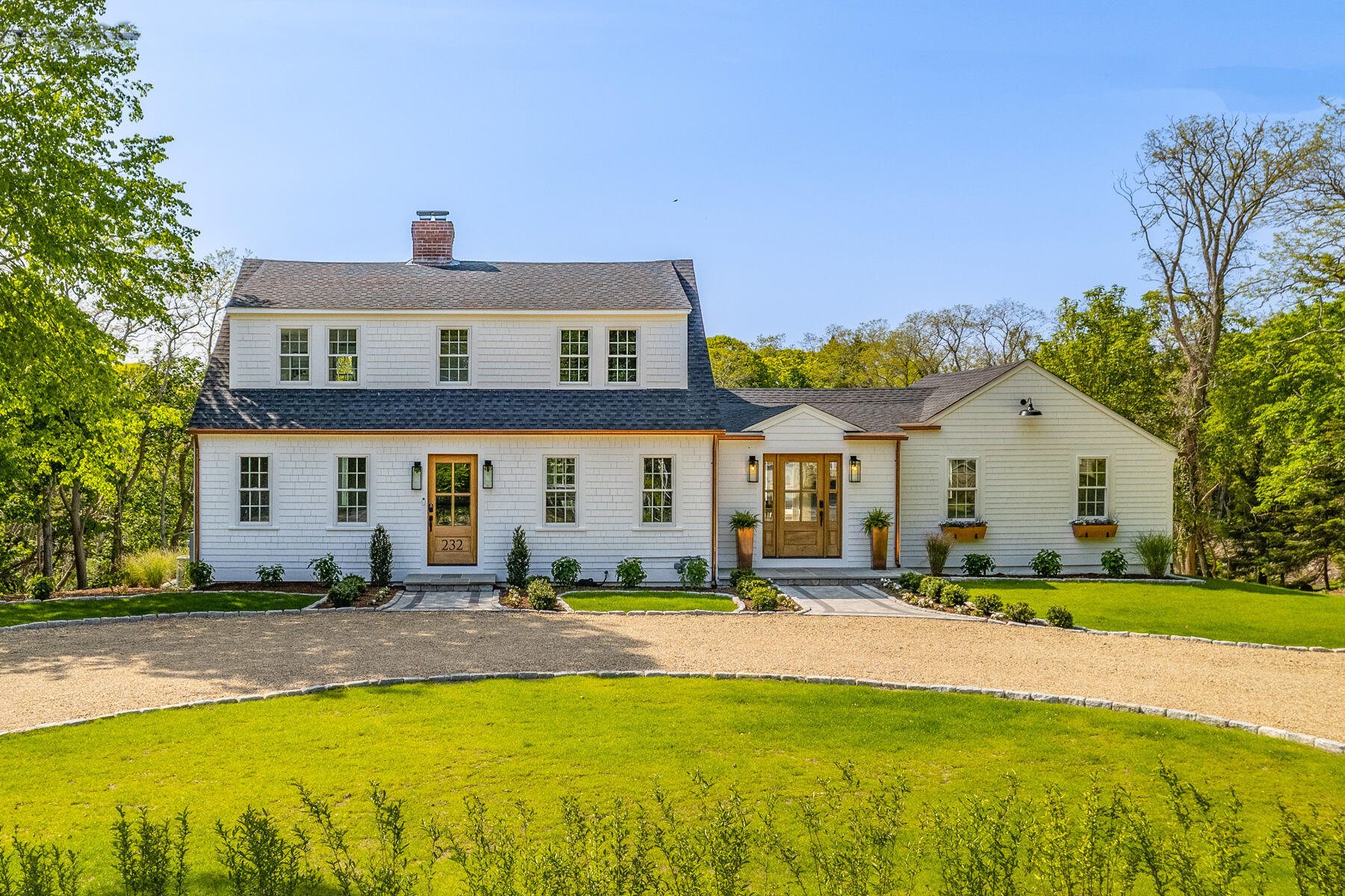 232 Tonset Road Orleans, MA 02653 - Photo 5 of 76 a front view of a house with a yard