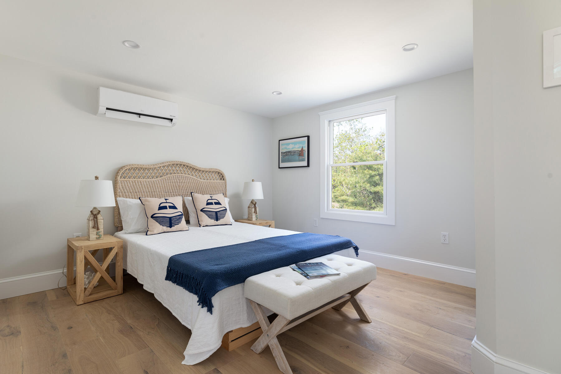 232 Tonset Road Orleans, MA 02653 - Photo 54 of 76 a bedroom with a bed and window