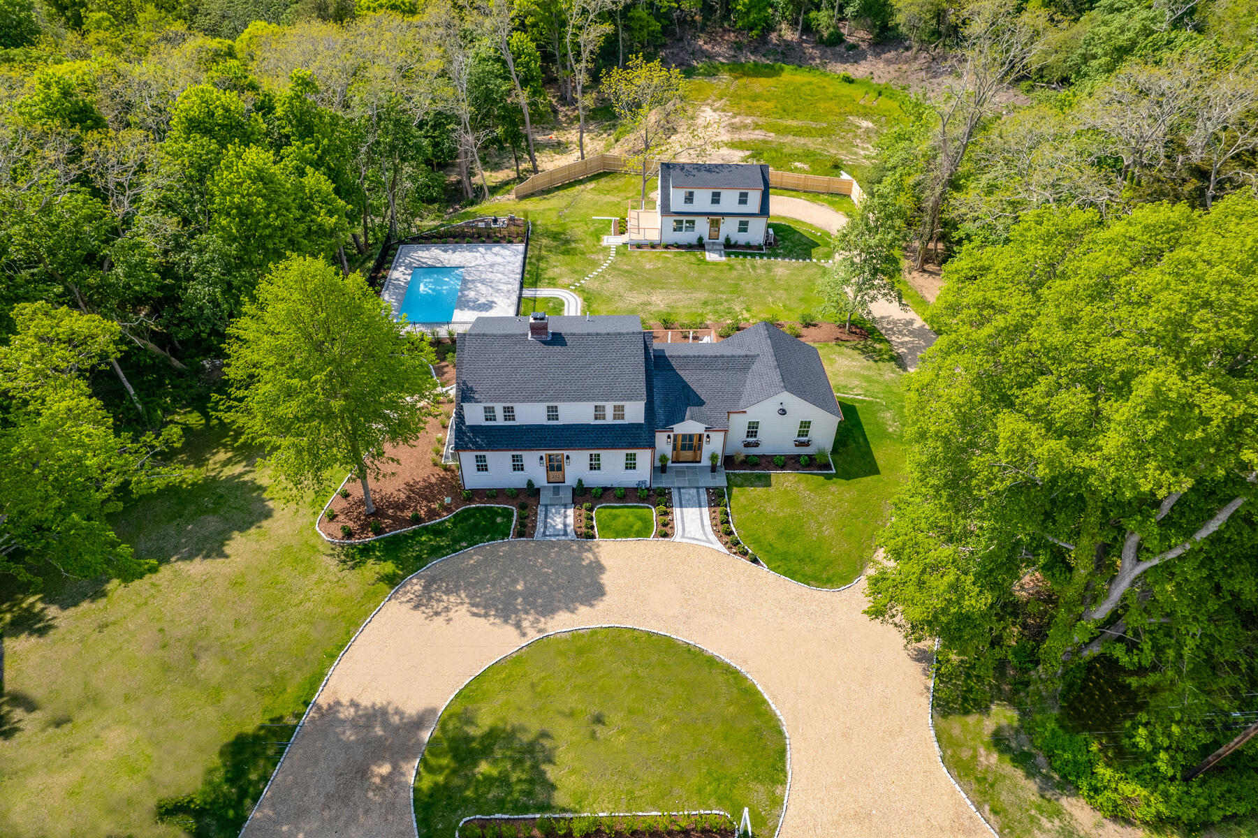 232 Tonset Road Orleans, MA 02653 - Photo 63 of 76 an aerial view of a house with swimming pool and garden