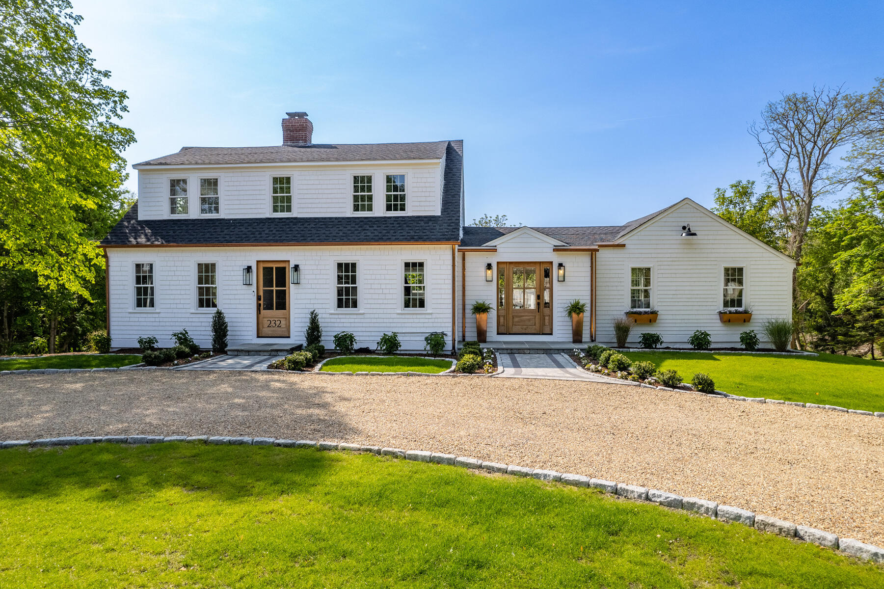 232 Tonset Road Orleans, MA 02653 - Photo 65 of 76 a view of a house with a backyard and a tree