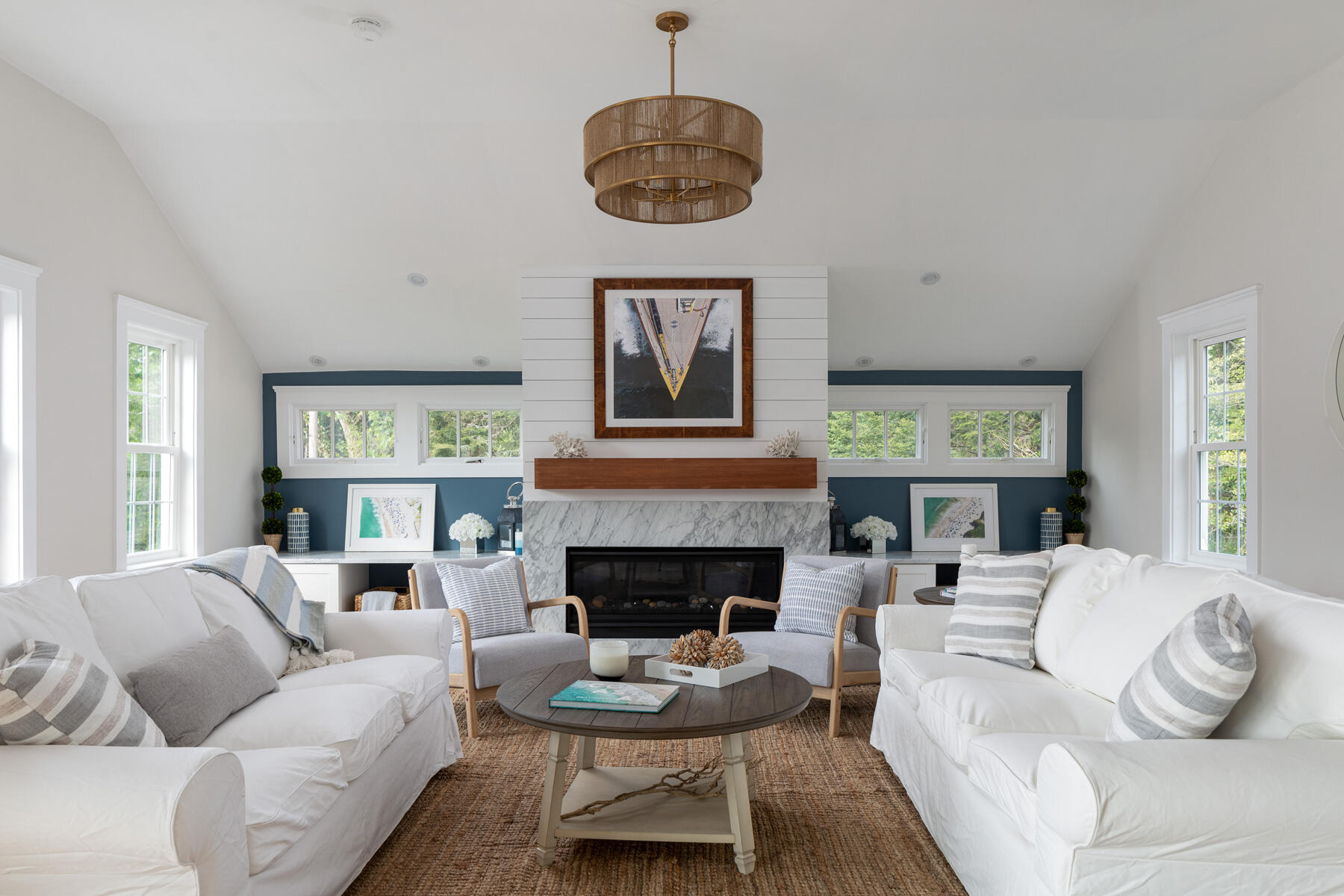 232 Tonset Road Orleans, MA 02653 - Photo 8 of 76 a living room with furniture a fireplace and window
