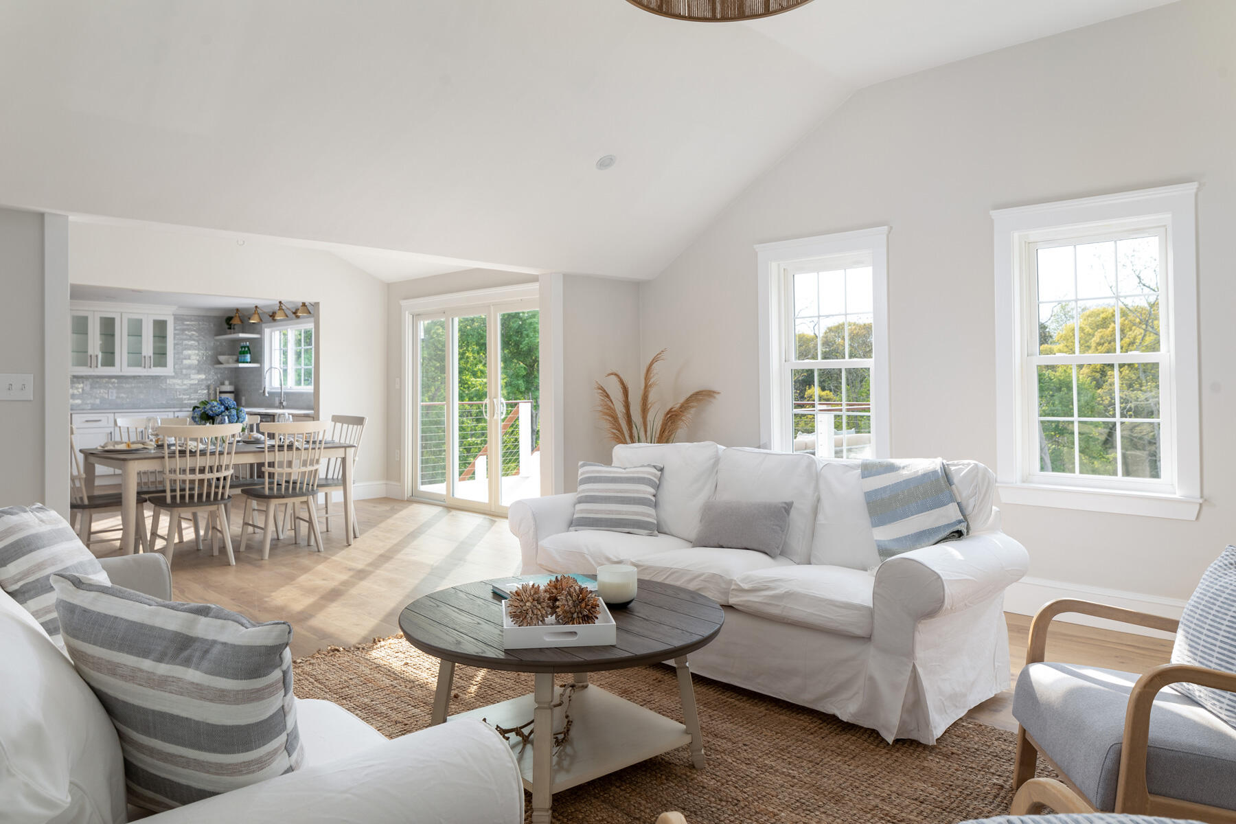 232 Tonset Road Orleans, MA 02653 - Photo 10 of 76 a living room with furniture and a large window