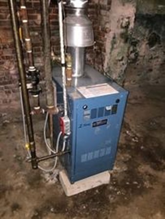 549 Bennington Street Boston, MA 02128 - Photo 4 of 5 a view of water heater room
