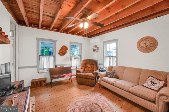 a bathroom with a sink vanity and a mirror