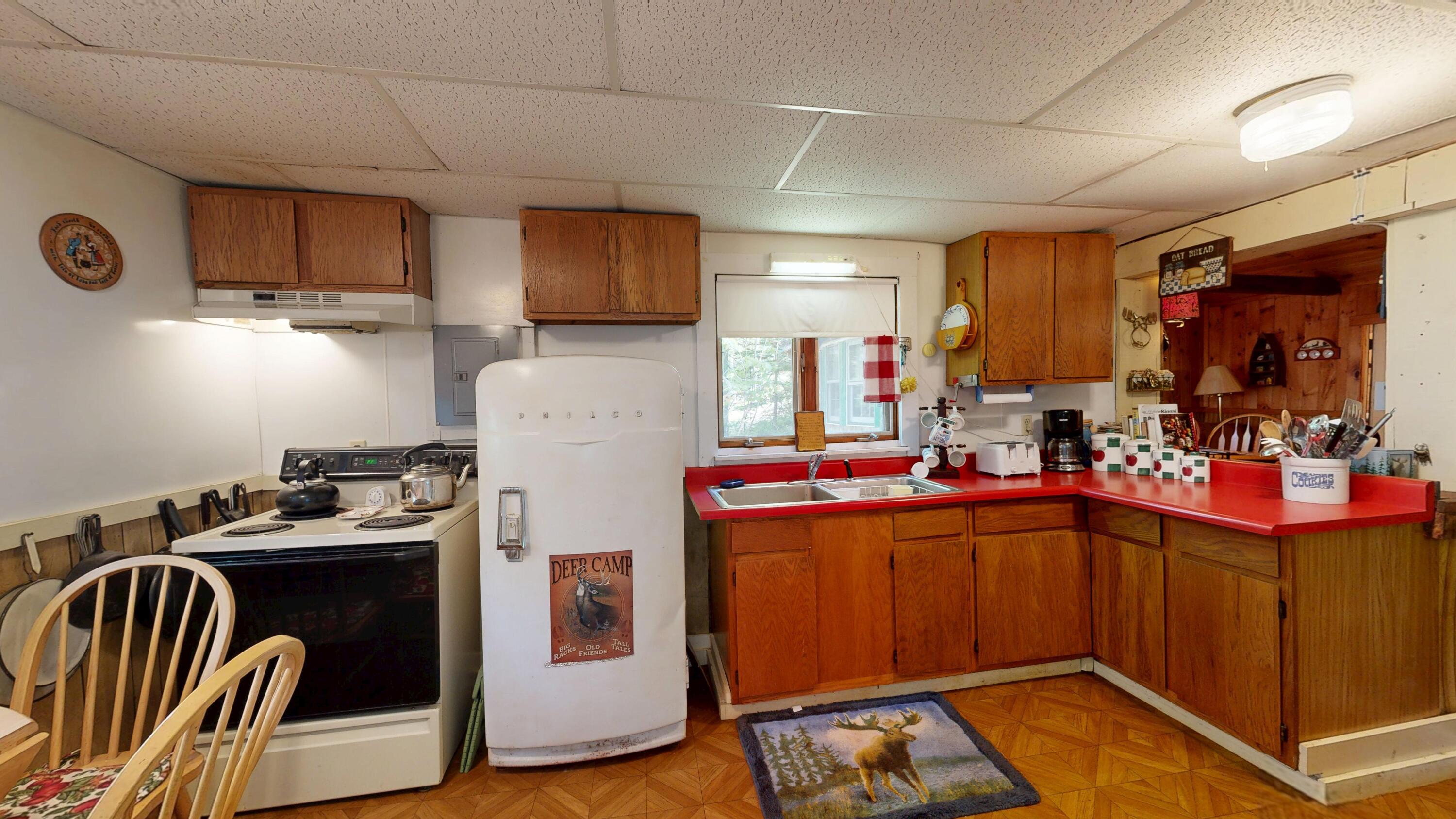 166 Bemis Road Oquossoc, ME 04964 - Photo 4 of 37