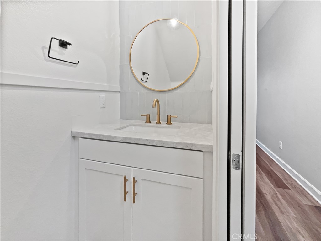 38352 Windingwalk Drive Murrieta, CA 92563 - Photo 11 of 28 a bathroom with a sink and a mirror