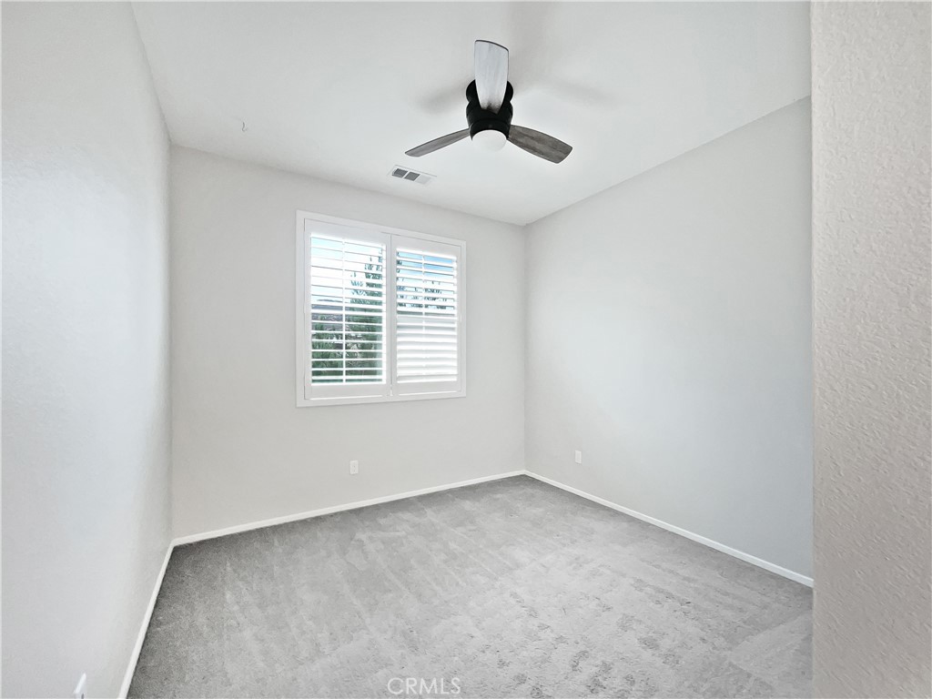 38352 Windingwalk Drive Murrieta, CA 92563 - Photo 13 of 28 a view of an empty room with a window